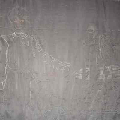 Embroidered panels with images of mill workers