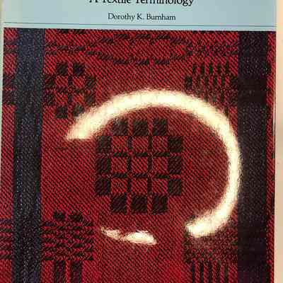 "Warp and Weft: A Textile Terminology"