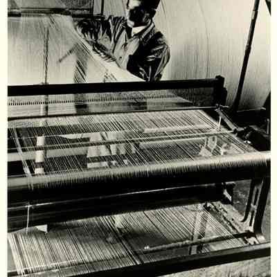 Photograph of Man Weaving