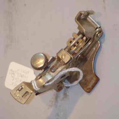 Sewing machine part