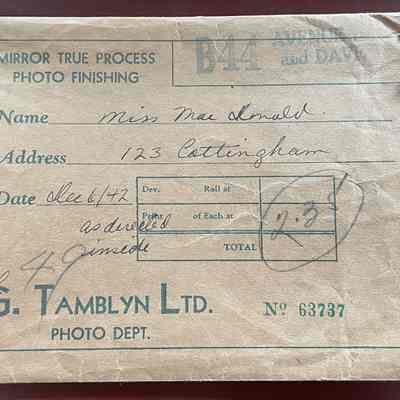 2021.12.310p: The image shows the front view of an envelope from G. Tamblyn Ltd.'s Photo Department, dated Dec. 6//[19]42. It held the photo negatives.