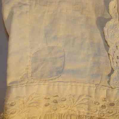 patch on right side of top above waist seam