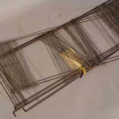 Harness frame with heddles
