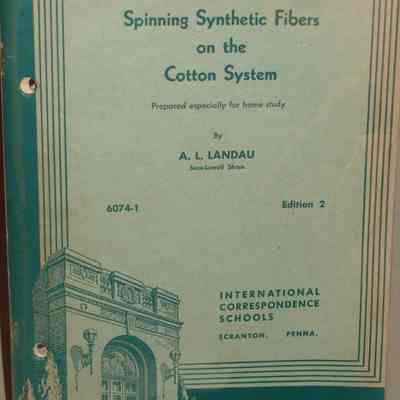 Spinning synthetic fibers on the cotton system : 6074-1 / By A.L. Landau.