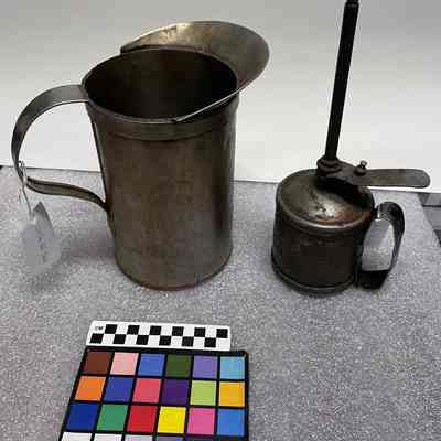 Oil Can and Metal Pitcher