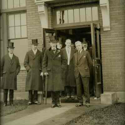Men in Front of Harding Carpets Limited