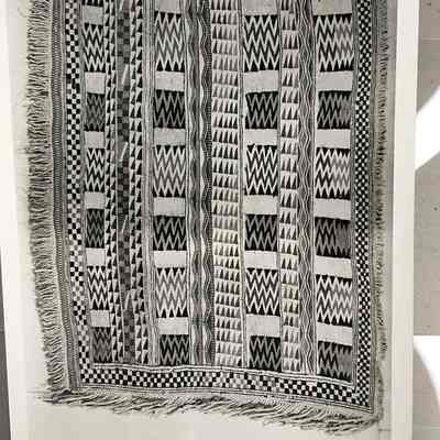 Two photographs of an Indigenous patterned coverlet blanket