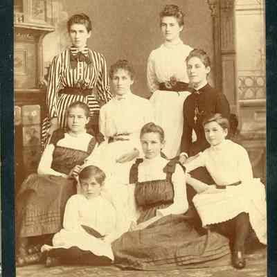 Photo of Dennistoun Girls - 2021.12.290d: Photo taken about 1886. (L to R) Standing: Annie, Mamie; Second Row: Helen, Margaret, Etta; Front row: Georgie, Jessie, Louie.