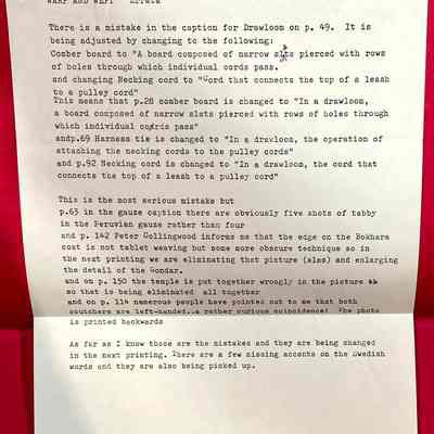 Warp and Weft - Notes on the Inside Back Cover: Image shows typed notes about changes that should be made to the book, that are glued to the inside of the back cover.