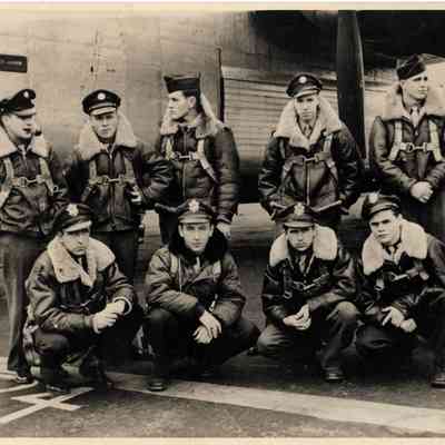 Crew of the B-24H "Pinup Girl" (1945): Edward Beebe is in the front row, at the far left.
