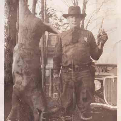 Pro. Winters with deer he killed with service pistol