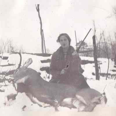 Miss Agnes Osborne, niece of Com. Osborne. Deer killed by first shot, 143 yds, Fall of 1936.