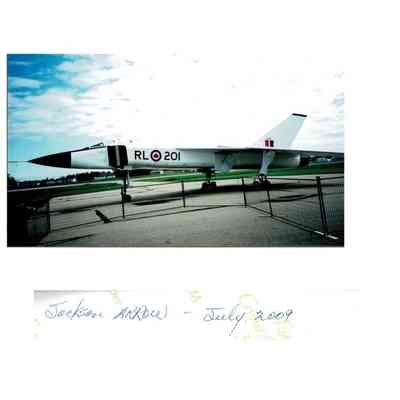 2 photos - Arrow Replica at AETE Cold Lake with CF-18 and Tutor & replica fenced off - AETA X added to tail