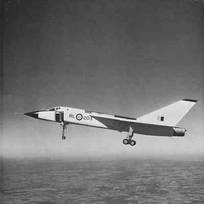 Arrow 203 - in flight - gear down - left side - pre-DayGlo