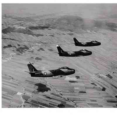3 Canadair Sabres (F86) in formation over Mont-Saint-Hilaire