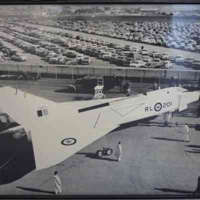 Arrow Upper view with parking lot in background
