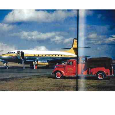 Colour Photo of Jetliner with Red A.V. Roe Canada Limited Fire Truck in Foreground