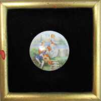 Untitled (Gentleman sitting and a Lady standing)