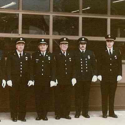 six firemen standing in front