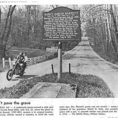 Grave in Middle of Road