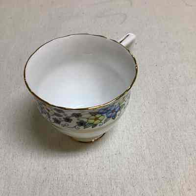 White Floral Bone China Cup + Saucer
