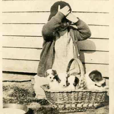 Unidentified Girl & Puppies