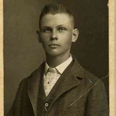 Unidentified Man sitting for Portrait