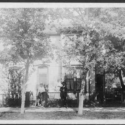 Unidentified People, Dog, & House