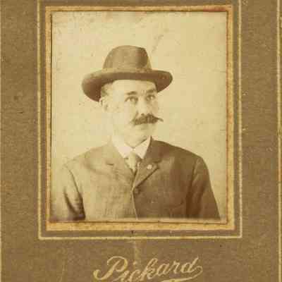 Unidentified Man wearing a Suit and Hat