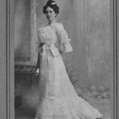 Young Woman in White Lingerie Dress