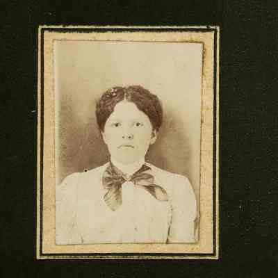 Unidentified Woman White Blouse, Ribbon Around Neck