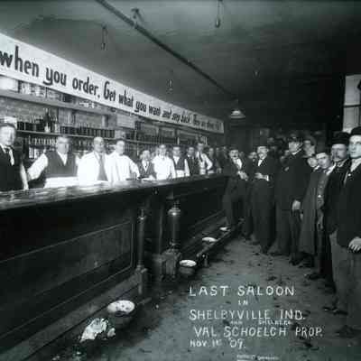 saloon, interior shot with bartenders and patrons