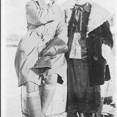 Two People On Barrell