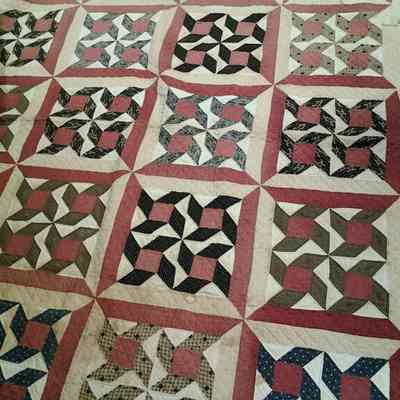Red Modified Pinwheel Quilt
