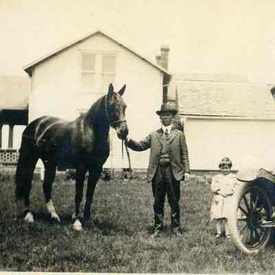 Unidentified Man & Child w/ Horse