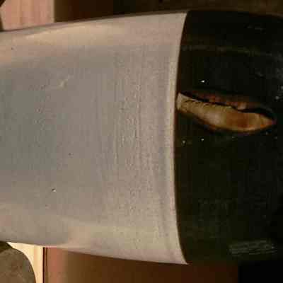 back of butter churn with flaw in glaze