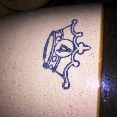 close-up of marking on butter churn