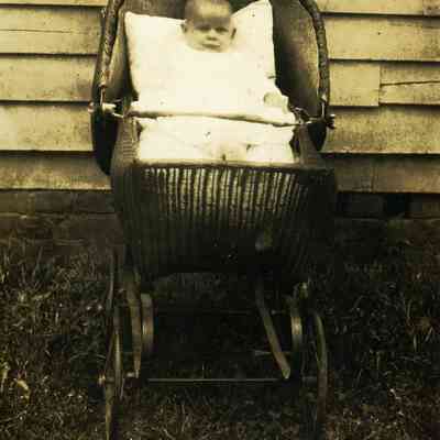 Unidentified Baby in a Wicker Carriage