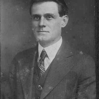  man, upper torso view and sitting at slight angle