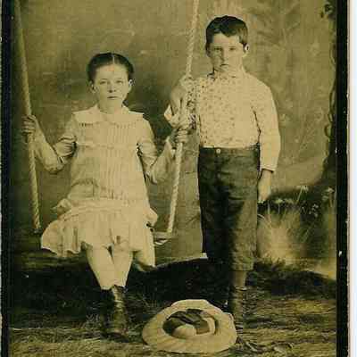 Two Children with Swing