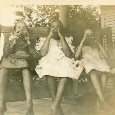 Unidentified Girls on Porch Swing