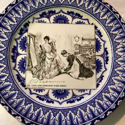 2001.016.001E: She finds consolation in her mirror