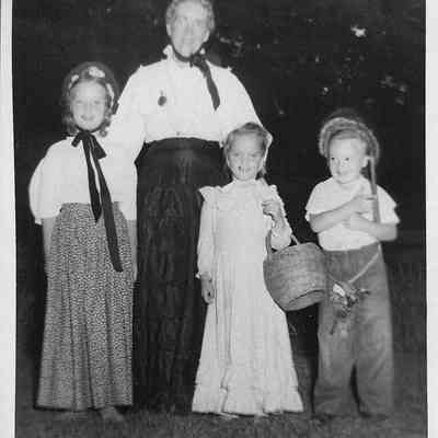  a woman and 3 children (