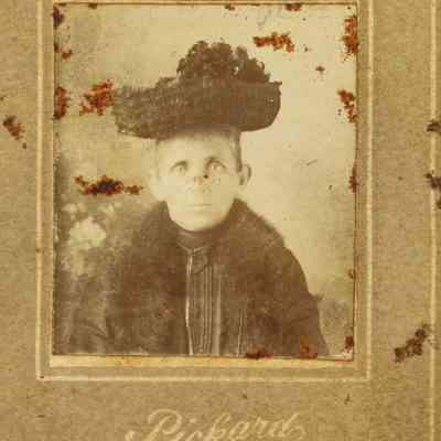 Unidentified Woman wearing a Large Hat