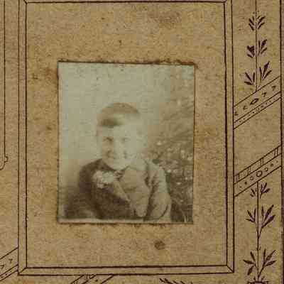 Unidentified Young Bay in a Suit with a Flower on his Lapel