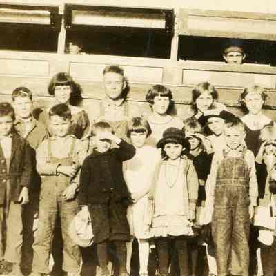 Earl Wasson & Unidentified Schoolchildren