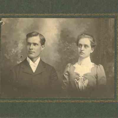 Unidentified Man and Woman looking to the left