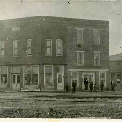 Unidentified Men in front of Brown's Shoes