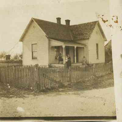 Unidentified Family in front of Old Farm House