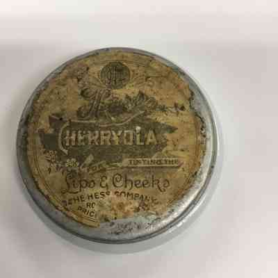 2025.032.001H: Tin with Cherryola brand lip & cheek tint